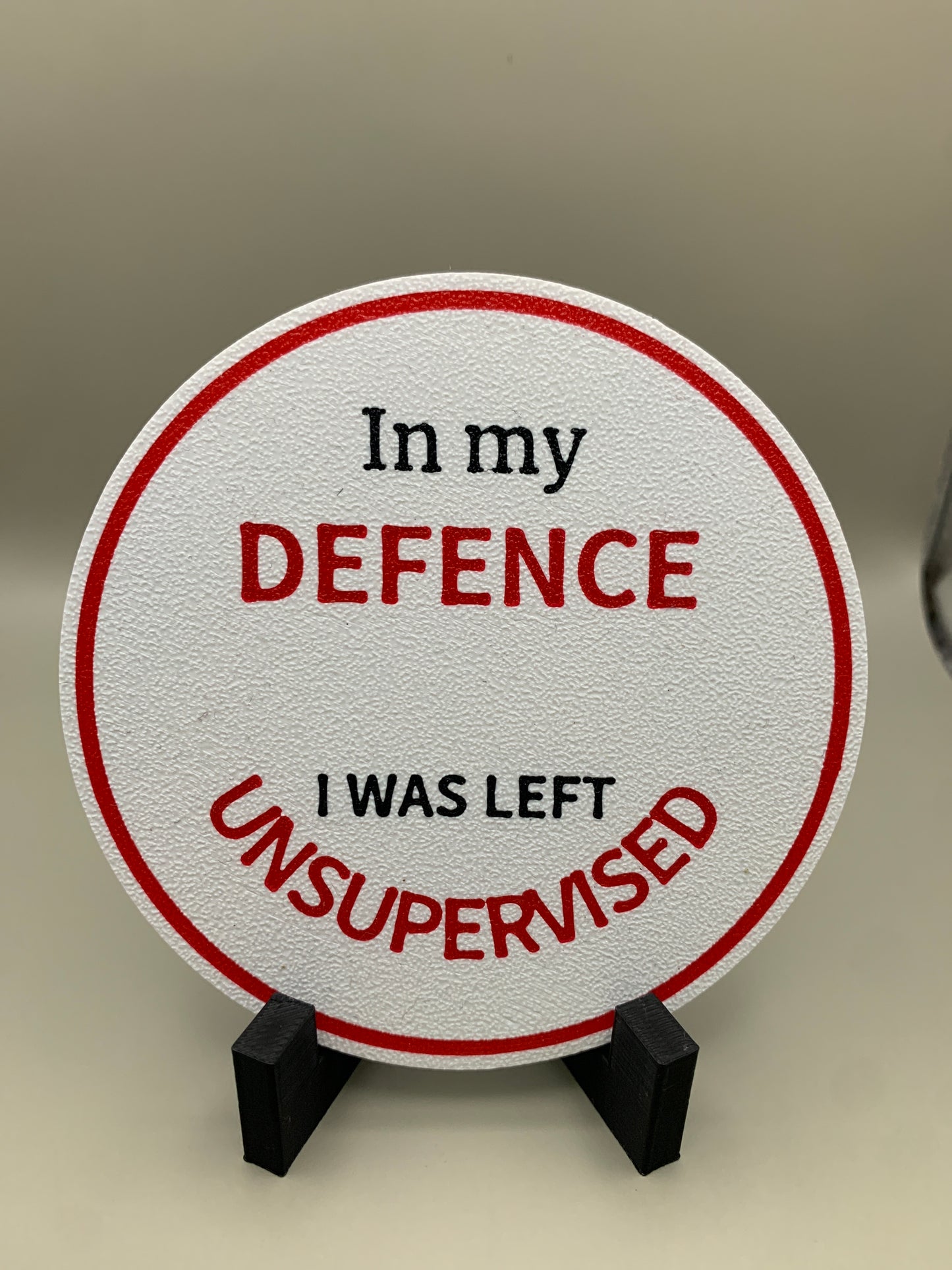 “In my defense” sign