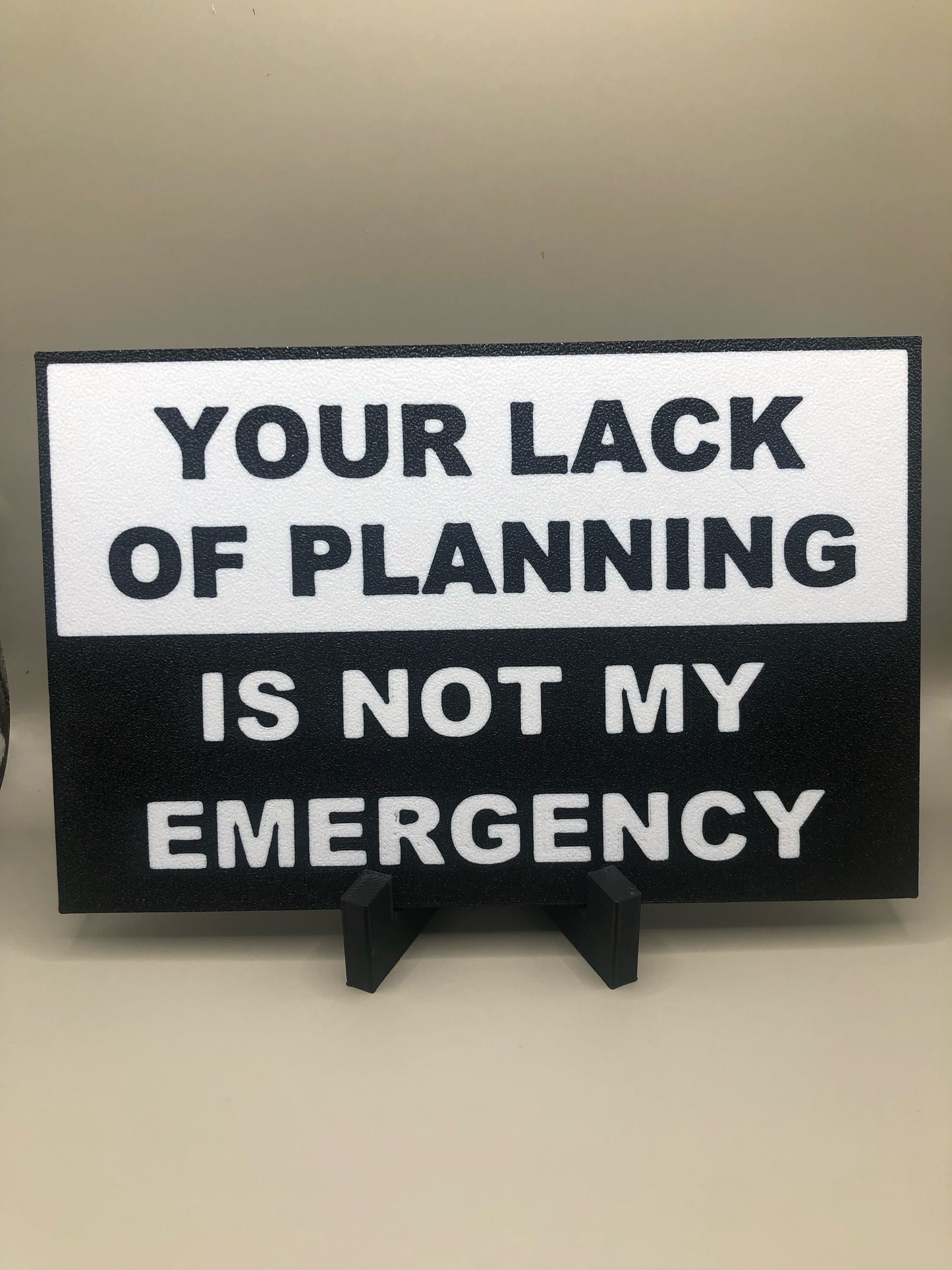 “Your lack of planning” Sign